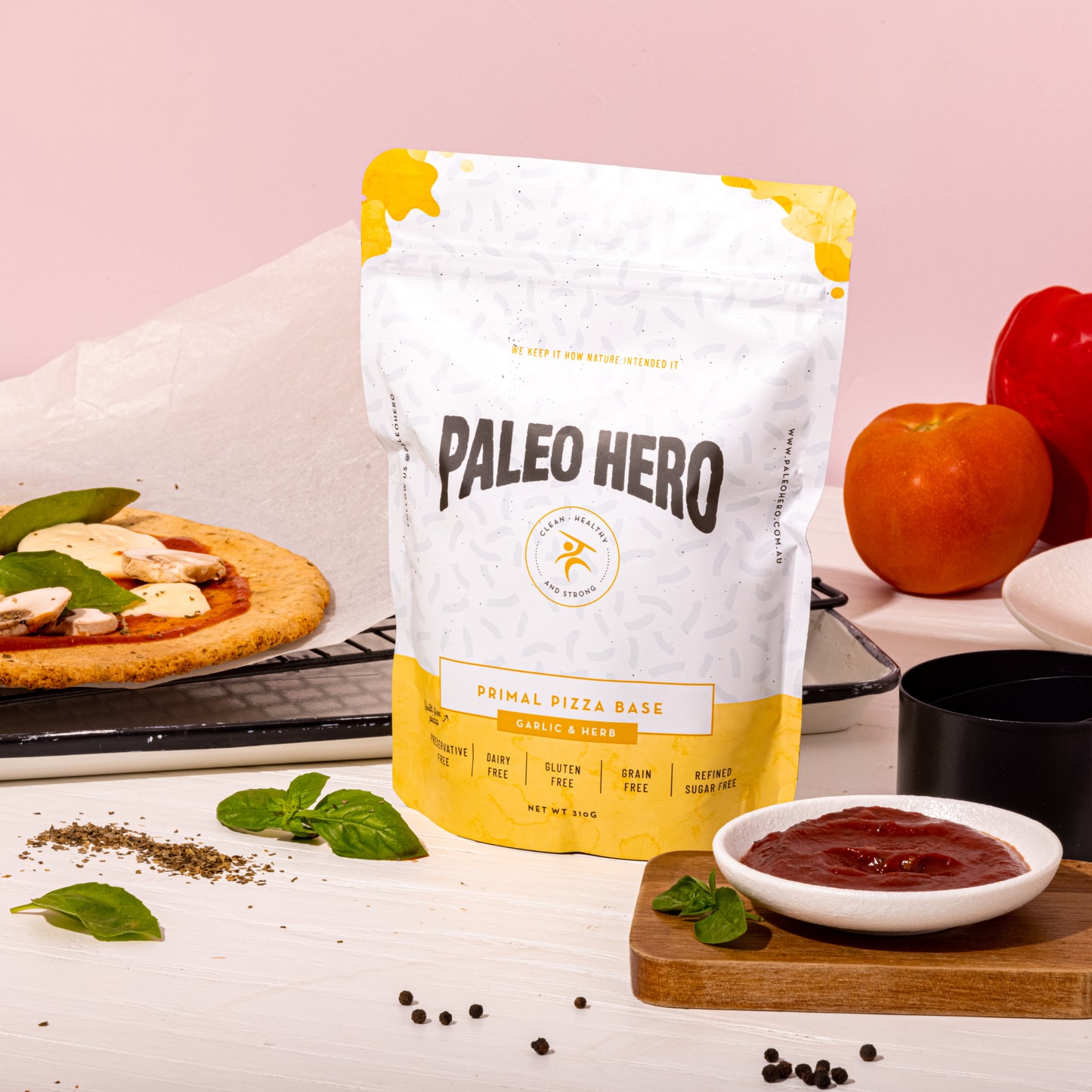 Paleo Hero pizza base package with ingredients on a table